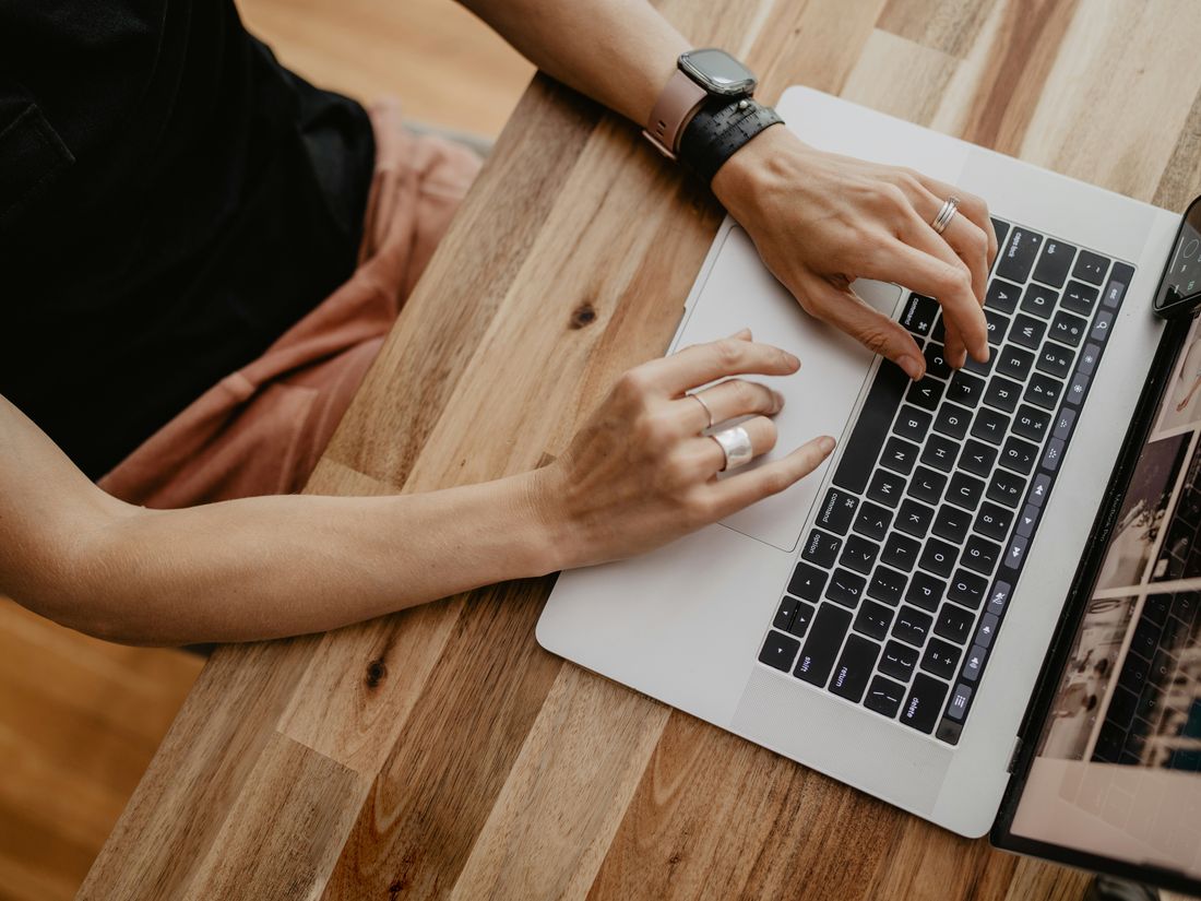 Consultant working independently on a laptop